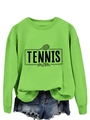 Flat lay of green Tennis Mom crewneck sweatshirt paired with distressed denim shorts - Fluorescent Green (Black Print)
