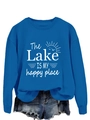Close-up of royal blue sweatshirt featuring white lake slogan and sun graphic design - Lake Blue (White Print)