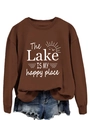 Detail of the lake is my happy place print on a brown crewneck sweatshirt - Coffee (White Print)