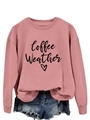 Flat lay of pink sweatshirt with Coffee Weather print paired with denim shorts - Rose Gold (Black Font)
