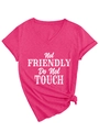 Detail of V-neck fuchsia t-shirt with Not Friendly text and side knot hem design - Rose Red