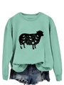 Detail view of mint green sweatshirt featuring a sheep silhouette with floral patterns - Light Green (Black Print)