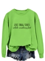 Détail d'un sweat vert néon avec texte imprimé noir et finitions des poignets côtelées - S / Vert Néon (Police Noire)