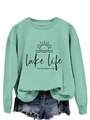 Detail of lake life print on a mint green crewneck sweatshirt and denim shorts - S / Light Green (Black Text)