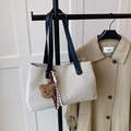 Chic cream canvas tote bag with black leather handles and plush bear charm accent - With Pendant Style / Black With Pendant