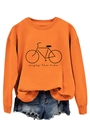 Detail of ribbed neckline and Enjoy the Ride bicycle print on orange sweatshirt - Orange (Black Print)