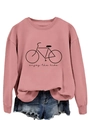 Detail of dusty rose crewneck sweatshirt featuring a black enjoy the ride bicycle graphic - Rose Gold (Black Font)