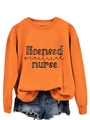 Detail of orange nurse sweatshirt with licensed practical nurse print and ribbed cuffs - Orange Sweatshirt (Black Text Graphic)