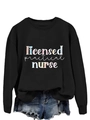 Flat lay of black long sleeve Licensed Practical Nurse sweatshirt with blue denim shorts - Black Sweatshirt (White Text)