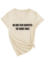 Detail of beige V-neck T-shirt with black text slogan and decorative side knot at the hem - S / Sand (Black Print)