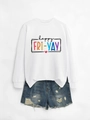 Flat lay of white sweatshirt with happy fri-yay print and frayed denim shorts - White Sweatshirt (Black Text)