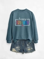Flat lay of blue happy fri-yay sweatshirt and distressed denim shorts for teens - Blue Sweatshirt (White Text)
