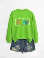 Detail showing neon green happy FRI-YAY sweatshirt and distressed denim shorts - Neon Green Sweatshirt (White Graphic)