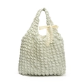 Light green bubble textured tote bag featuring a delicate cream lace bow ornament - Green
