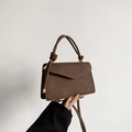 Minimalist brown envelope crossbody bag with knot handle detail and matte finish - Brown