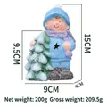 Luminous ceramic boy figurine in blue winter outfit with small snowy Christmas tree - 5217B Boy With Tree