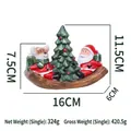 Christmas ceramic rocking boat ornament featuring Santa Claus and snowman on a wooden base - Boat Santa And Reindeer Style (Light Up)
