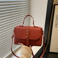 Chic reddish brown lychee pattern PU leather crossbody bag with golden buckle detail - Red