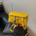 Fashionable bright yellow crossbody box bag with silver robot pendant and buckle detail - Yellow