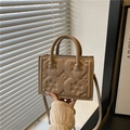 Structured beige tote bag with floral embossing and detachable shoulder strap for women - Khaki