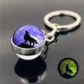 Luminous howling wolf keychain in purple with glow in the dark effect glass ball - Mysterious Deep Purple Wolf Moon (XSWX2748-2)