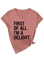 Detail of V-neck T-shirt showing printed text and stylish front hem knot decoration - Rose Gold (Black Print)