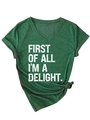 Close-up of V-neck cotton T-shirt featuring 'FIRST OF ALL I'M A DELIGHT' white slogan print - Vintage Green (White Print)