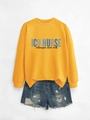 Flat lay of yellow ICU NURSE sweatshirt with distressed blue denim shorts and raw hem - Yellow (Black Print)