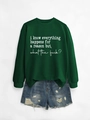 Detail of green crewneck sweatshirt with white slogan and distressed denim shorts set - Dark Green Sweatshirt (White Font)