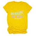 Detail of round neckline and roll-up sleeves on yellow cotton T-shirt with graphic print - Yellow