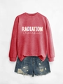 Flat lay of a red radiation therapist sweatshirt paired with distressed denim shorts - Red Sweatshirt (White Text)