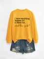Detail of yellow sweatshirt with gothic print and distressed denim shorts - Yellow Sweatshirt (Black Font)