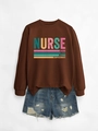 Detail of dark brown nurse sweatshirt with vintage print and distressed denim shorts - Coffee