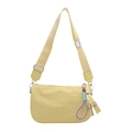 Lightweight pale yellow nylon crossbody bag with adjustable wide strap and embroidery - With Pendant / Yellow