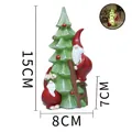 Babbo Natale in resina che sale sull'albero con funzione luminosa e misure di 15 cm - Albero di Natale Verde con Gnomi (Luminoso)