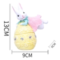 Easter resin bunny figurine wearing a pink shawl on a yellow egg base, 13cm height - Yellow Egg Kicking Pink Rabbit(HA0021D)