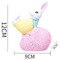 Easter bunny resin figurine sitting on a pink lace egg with rhinestone details, 12cm tall - Pink Egg Leg-Lift Yellow Rabbit(HA0021E)