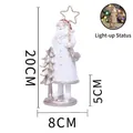 Kerstman figuur in wit gewaad met LED verlichte ster 20cm hars tafelornament - Witte Ster Staf Kerstman (HA002A)