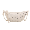 Bolso de hombro crema tipo media luna con estampado de lazos y correa anudada - Blanco