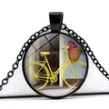 Vintage necklace with black metal pendant featuring yellow bicycle and flower basket - Yellow Bike Street Floral Style (JY007494-5)