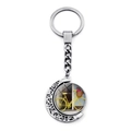Vintage bicycle keychain featuring a silver rotating moon frame and floral basket design - Yellow Bike Pink Flowers Style (JY007502-5)