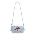 Borsa a tracolla celeste e crema con fiocco rosso e ciondolo a cuore - Blu