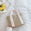 Handmade beige straw tote bag with elegant light pink ribbon handles for summer beach - White
