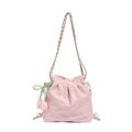 Pink quilted bucket bag with gold chain strap and decorative tulip pendant for women - Pink