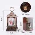 Farol de agua navideño de bronce con figura de Papá Noel y efecto de nieve brillante - Papá Noel