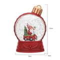Lanterna natalizia ad acqua con gnomo in auto rossa e decorazione glitterata - Babbo Natale in auto rossa