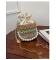 Detail of colorful woven straw bucket bag with pearl handle and gold chain strap - Khaki