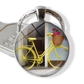 Vintage yellow bicycle with flower basket charm on silver round glass keychain - Yellow Bicycle with Red Flowers (JY007506-5)