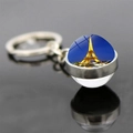Silver Eiffel Tower keychain featuring a double-sided glass ball with night view - Bright Lights Style (JY007582-10)