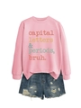 Detail of pink sweatshirt with slogan print and distressed denim shorts outfit set - Pink